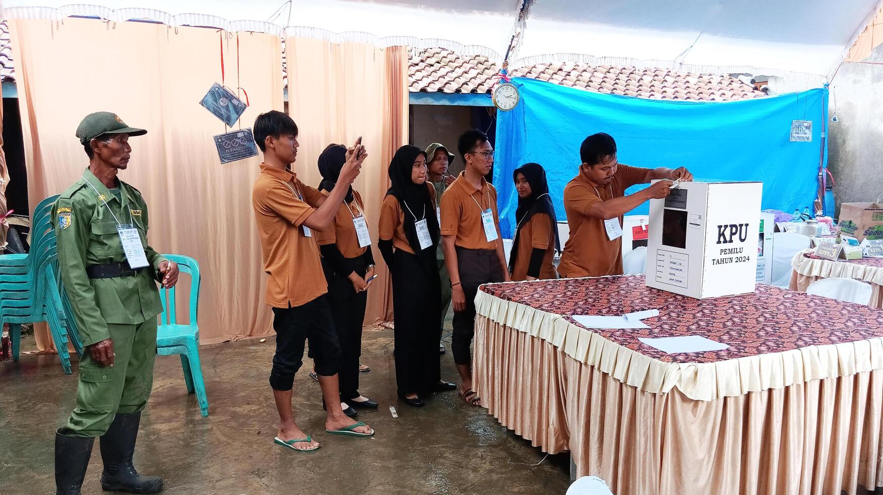 Demak, Indonesia - February, 2024 - Vote counting process at TPS, Indonesian presidential election. photo