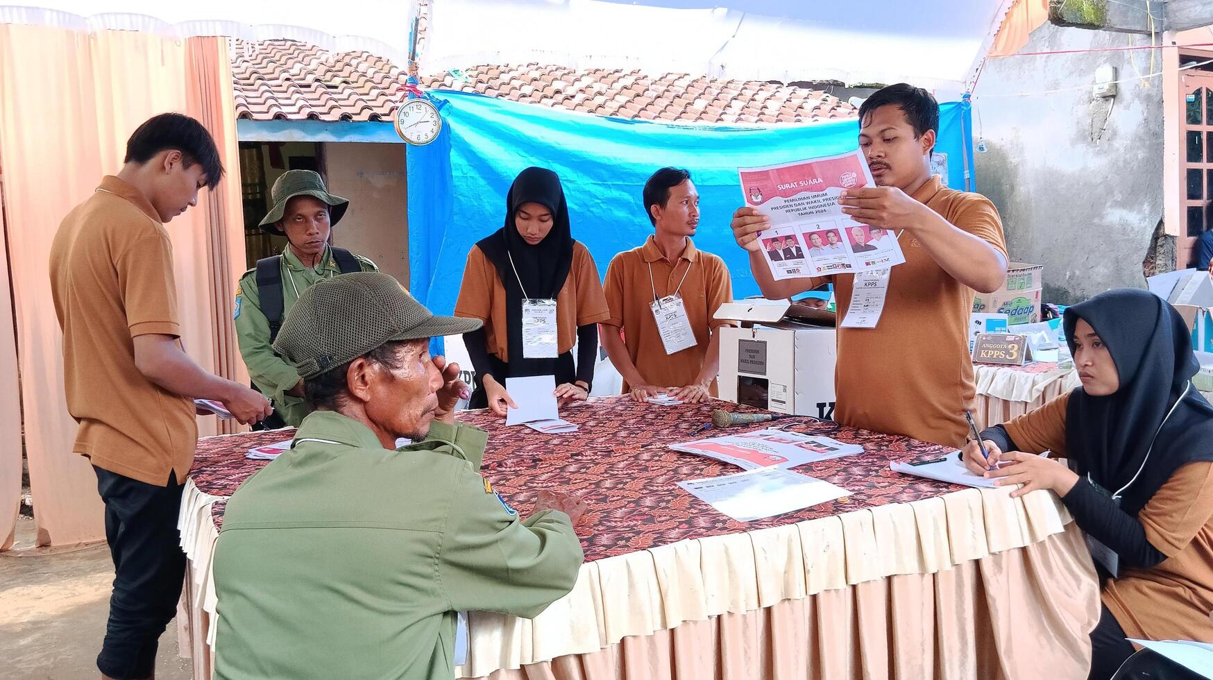 Demak, Indonesia - February, 2024 - Vote counting process at TPS, Indonesian presidential election. photo