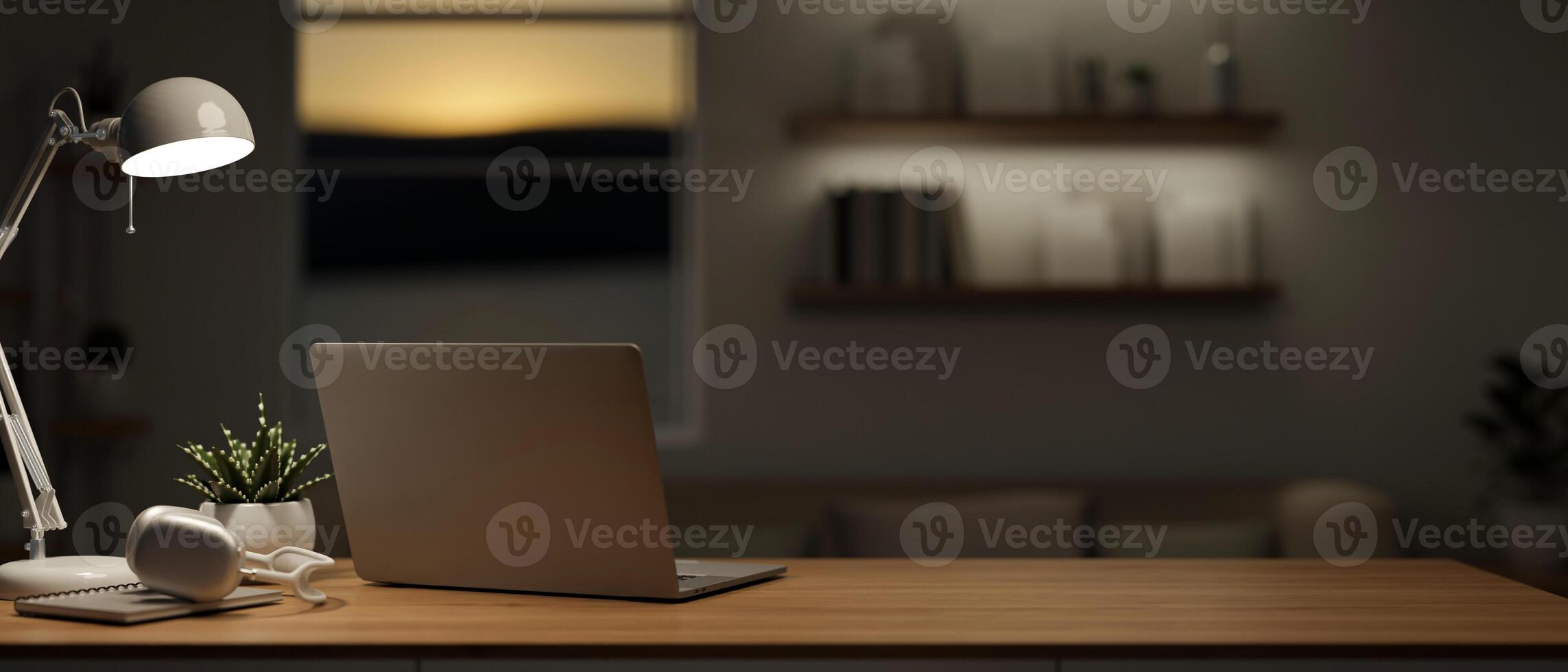 A back view image of a laptop computer on a wooden table in a modern dark living room at night. photo