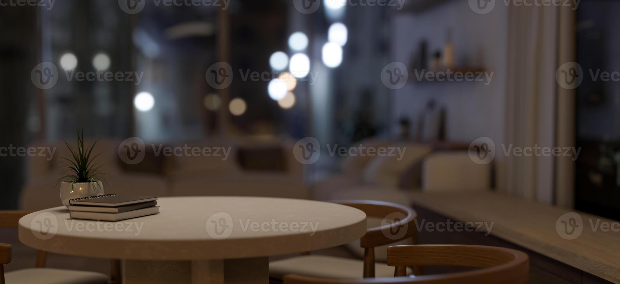 A space for displaying products on a round table in a contemporary and cozy living room at night. photo