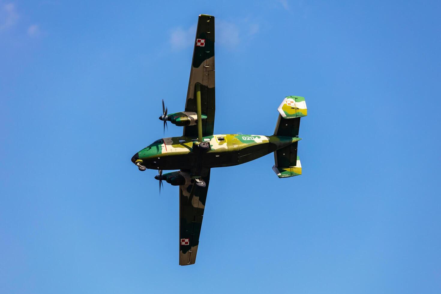 Radom, Poland, 2023 - Polish Air Force PZL M28 Bryza transport plane flying. Aviation and military aircraft. photo