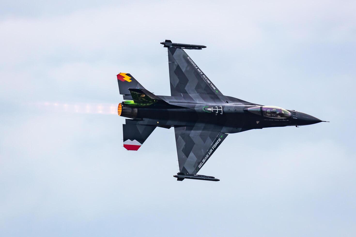 Radom, Poland, 2023 - Belgian Air Force Lockheed F-16 Fighting Falcon fighter jet plane flying. Aviation and military aircraft. photo
