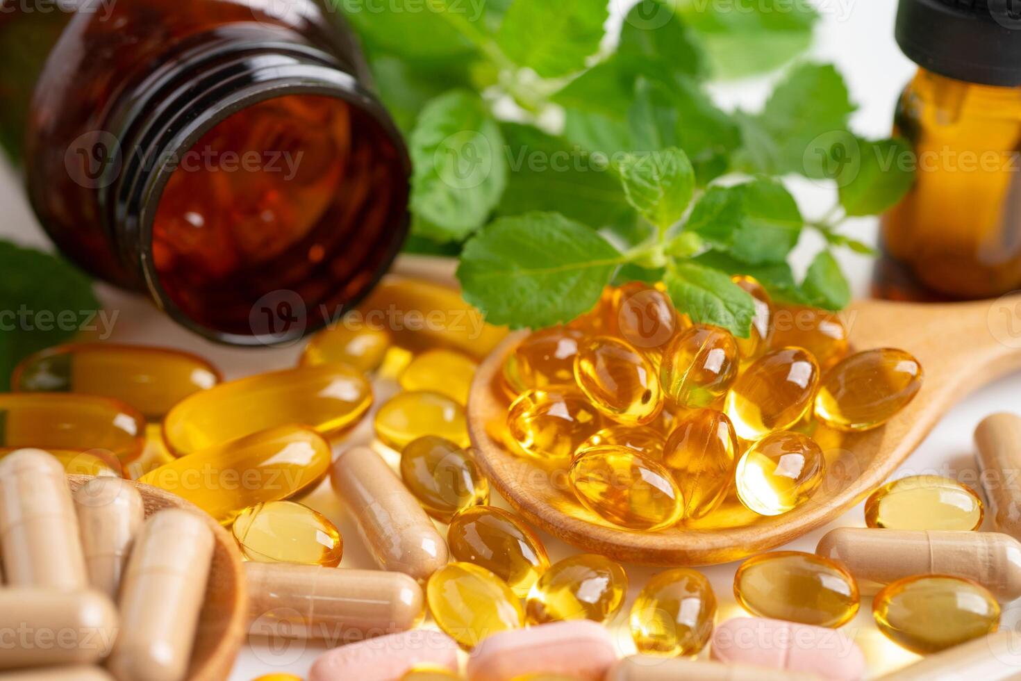 Alternative medicine herbal organic capsule with vitamin E omega 3 fish oil, mineral, drug with herbs leaf natural supplements for healthy good life. photo