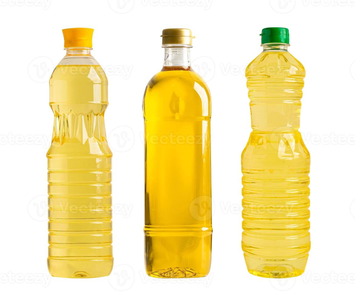 Vegetable oil with olive oil in different bottle for cooking isolated on white background. photo