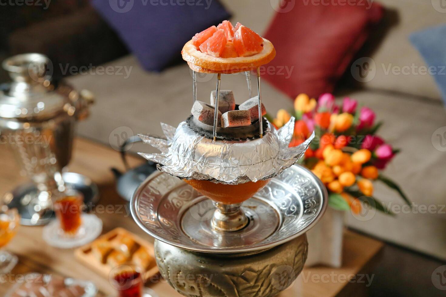 Tea Pot Filled With Citrus-Infused Water on Tabletop photo