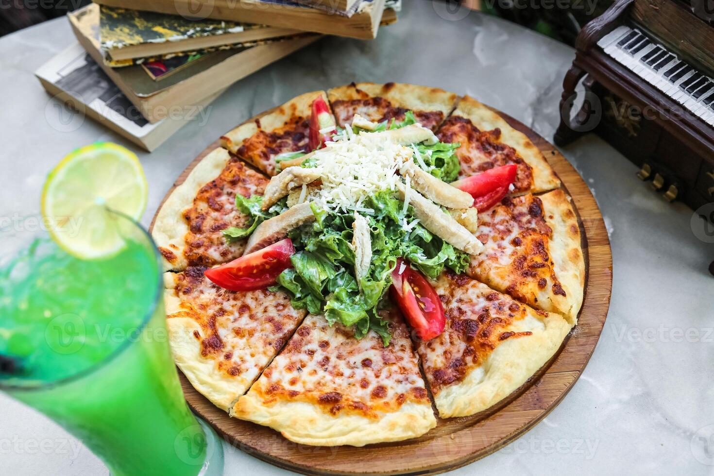 Pizza on Wooden Cutting Board photo