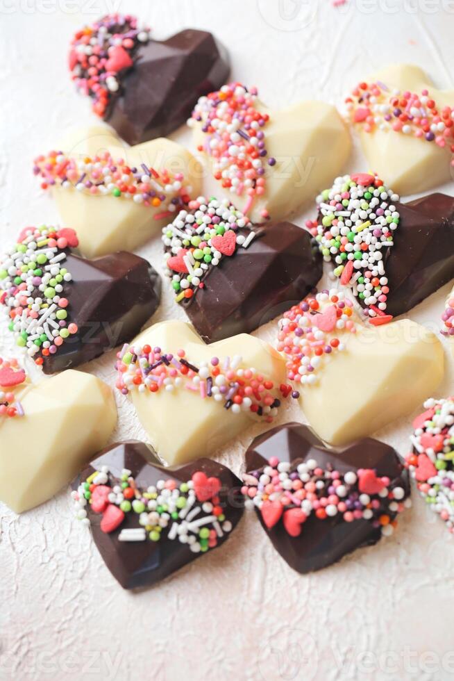 Assorted Heart-Shaped Chocolates Arranged on a Table photo