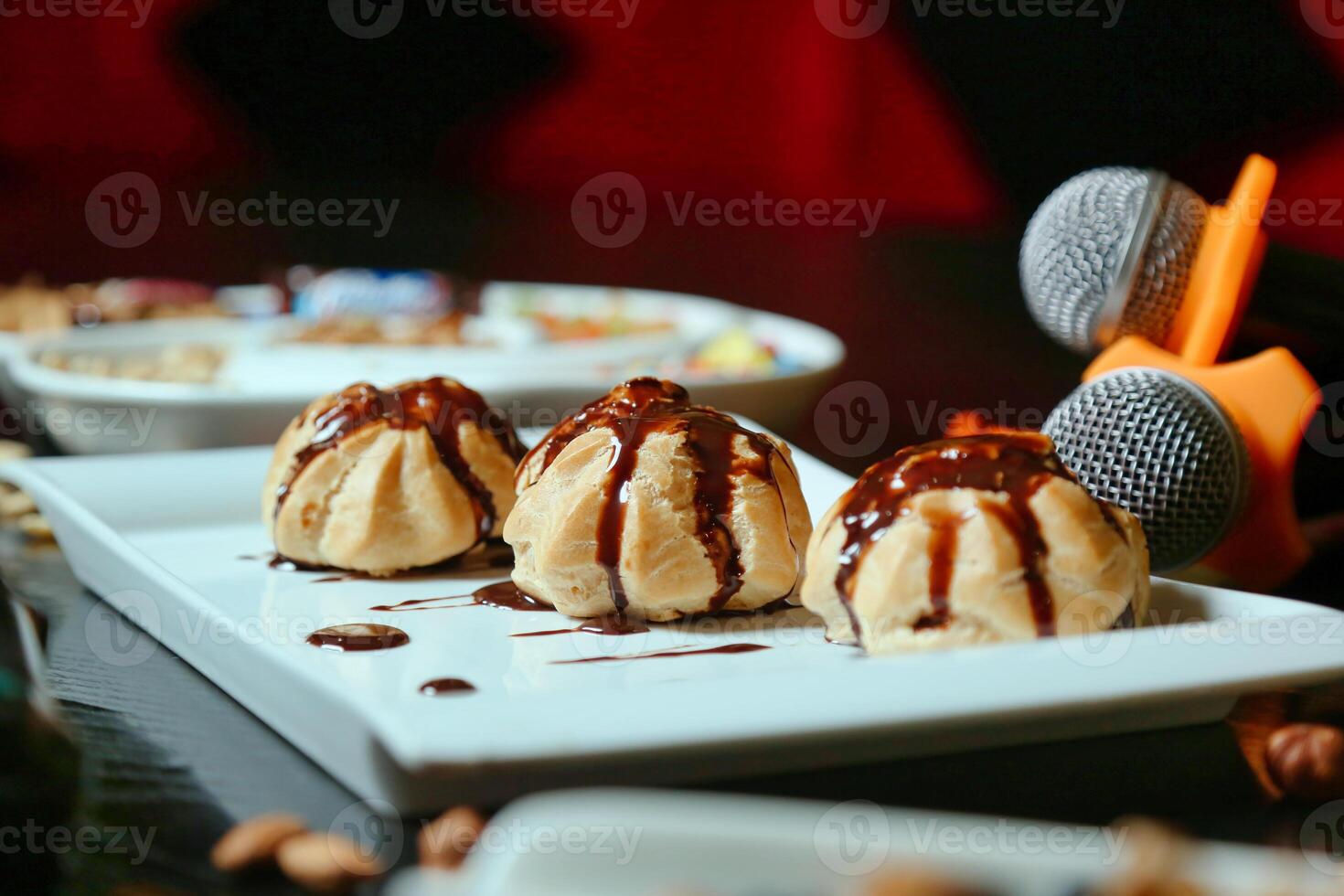 Three Scoops of Ice Cream Topped on a White Plate photo