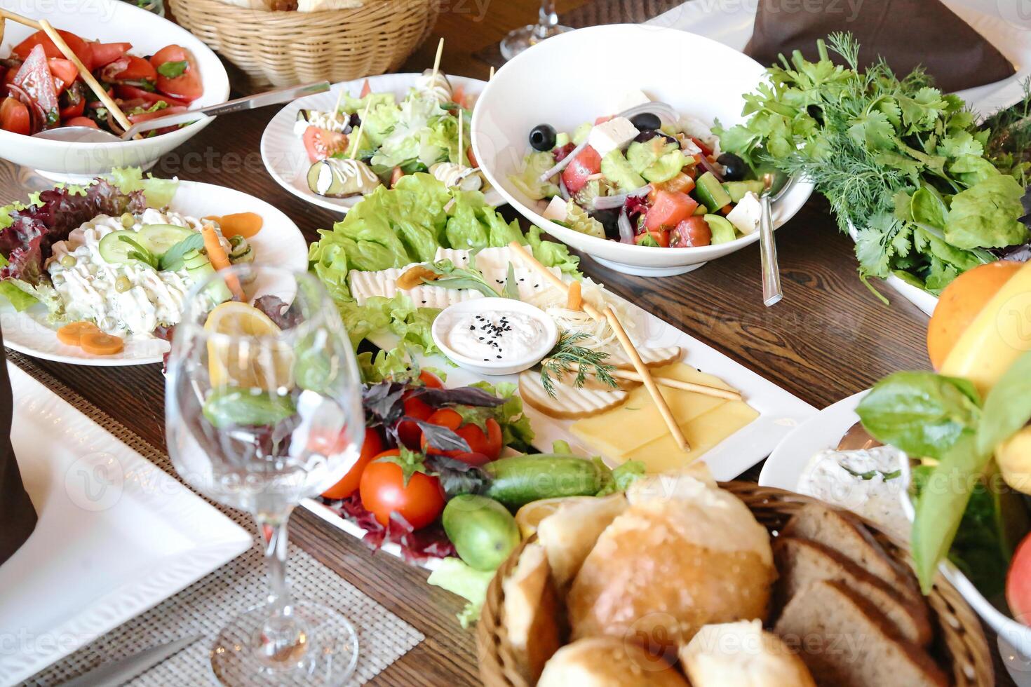 Abundance of Food on Wooden Table photo