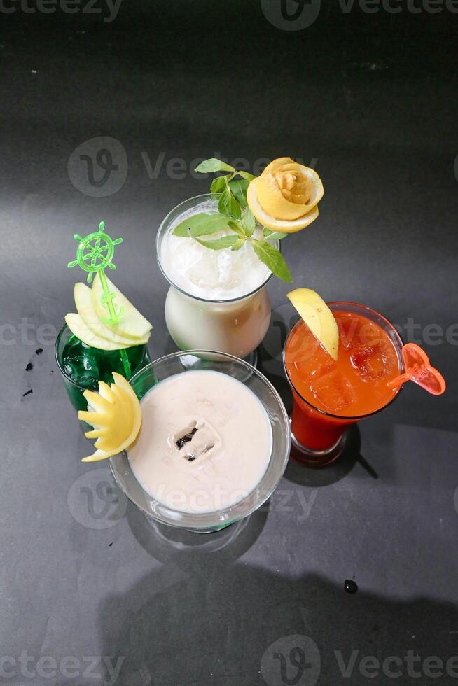 Group of Various Drinks Placed on a Table photo