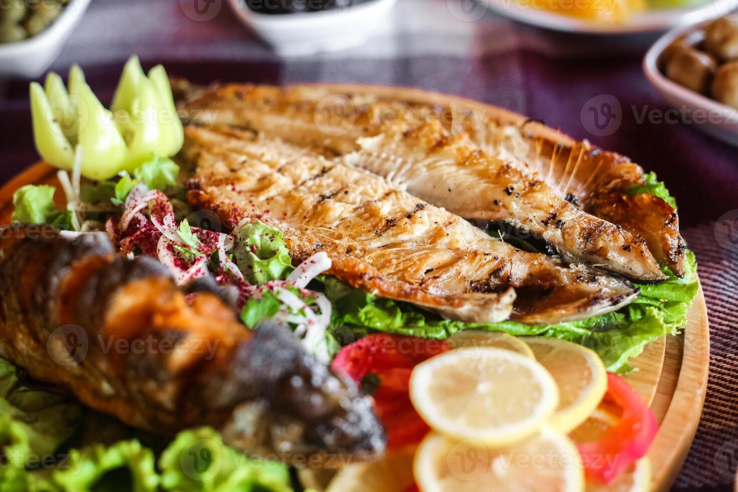 Close Up of a Deliciously Arranged Plate of Food on a Table photo