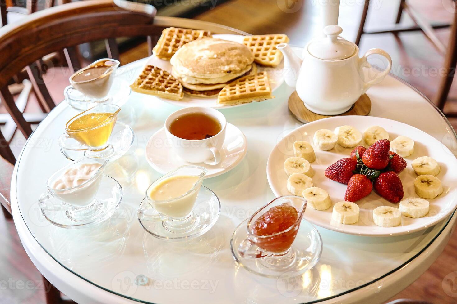 Table With Fruit and Waffles photo