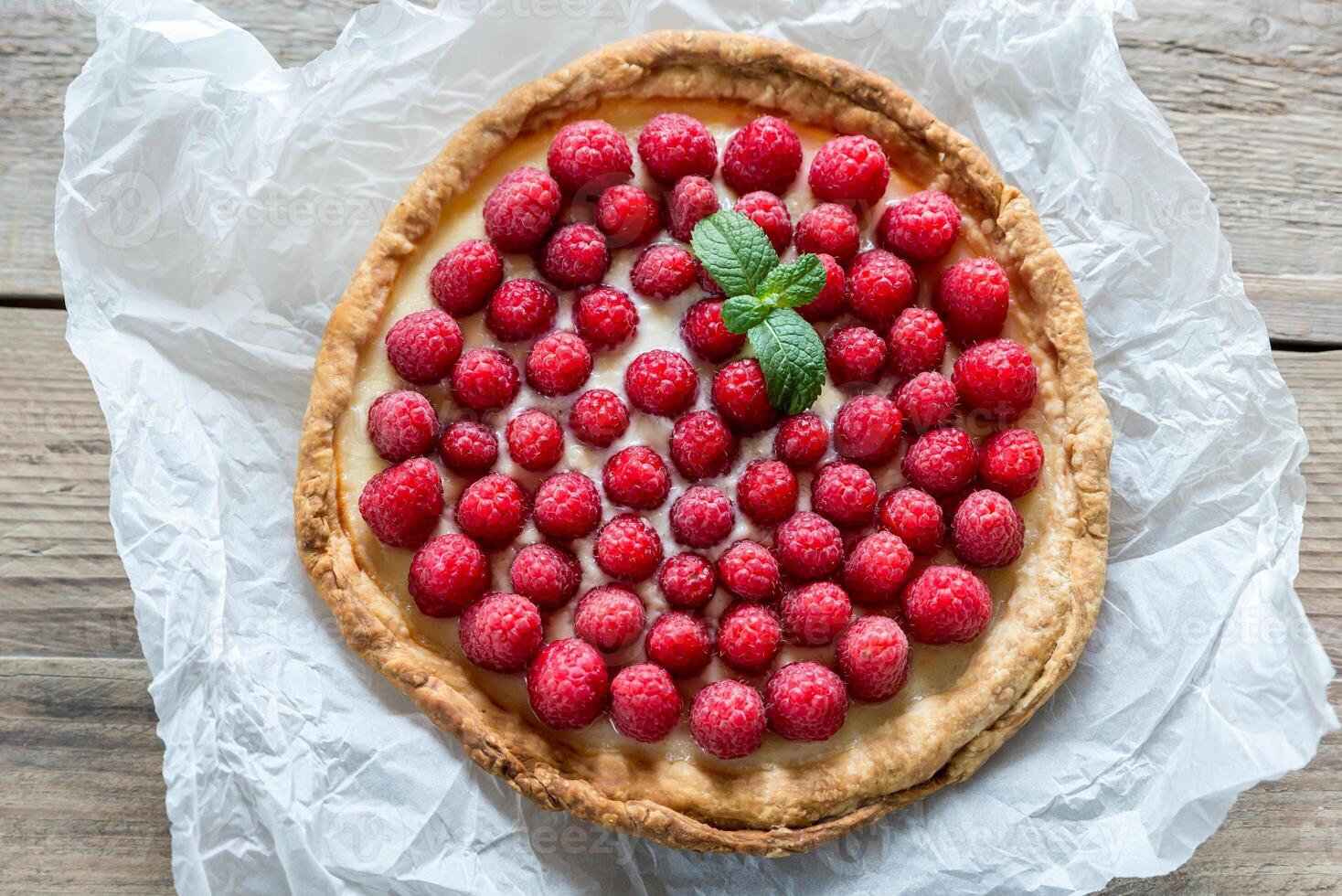 Raspberry tart with custard photo