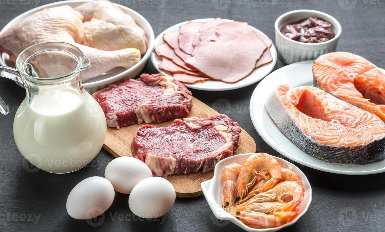 Protein diet raw products on the wooden background photo