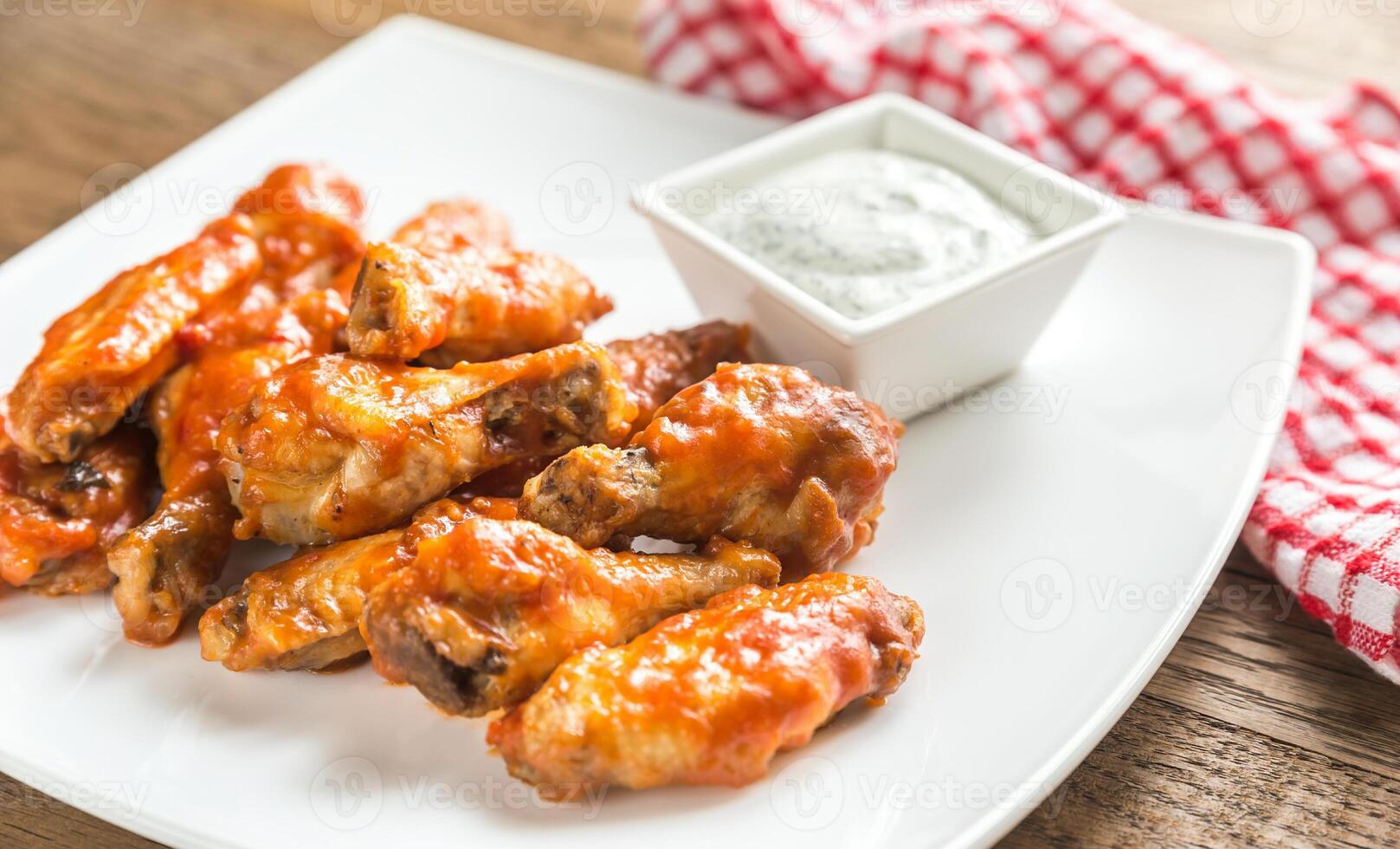 Portion of buffalo chicken wings photo