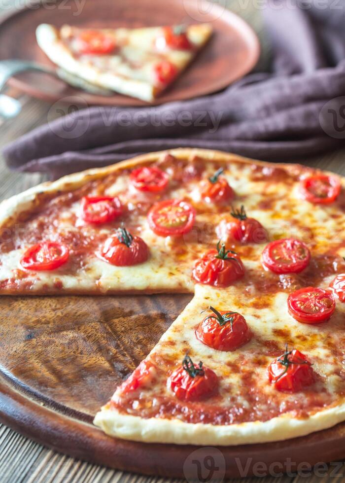 Pizza with cherry tomatoes and mozzarella photo