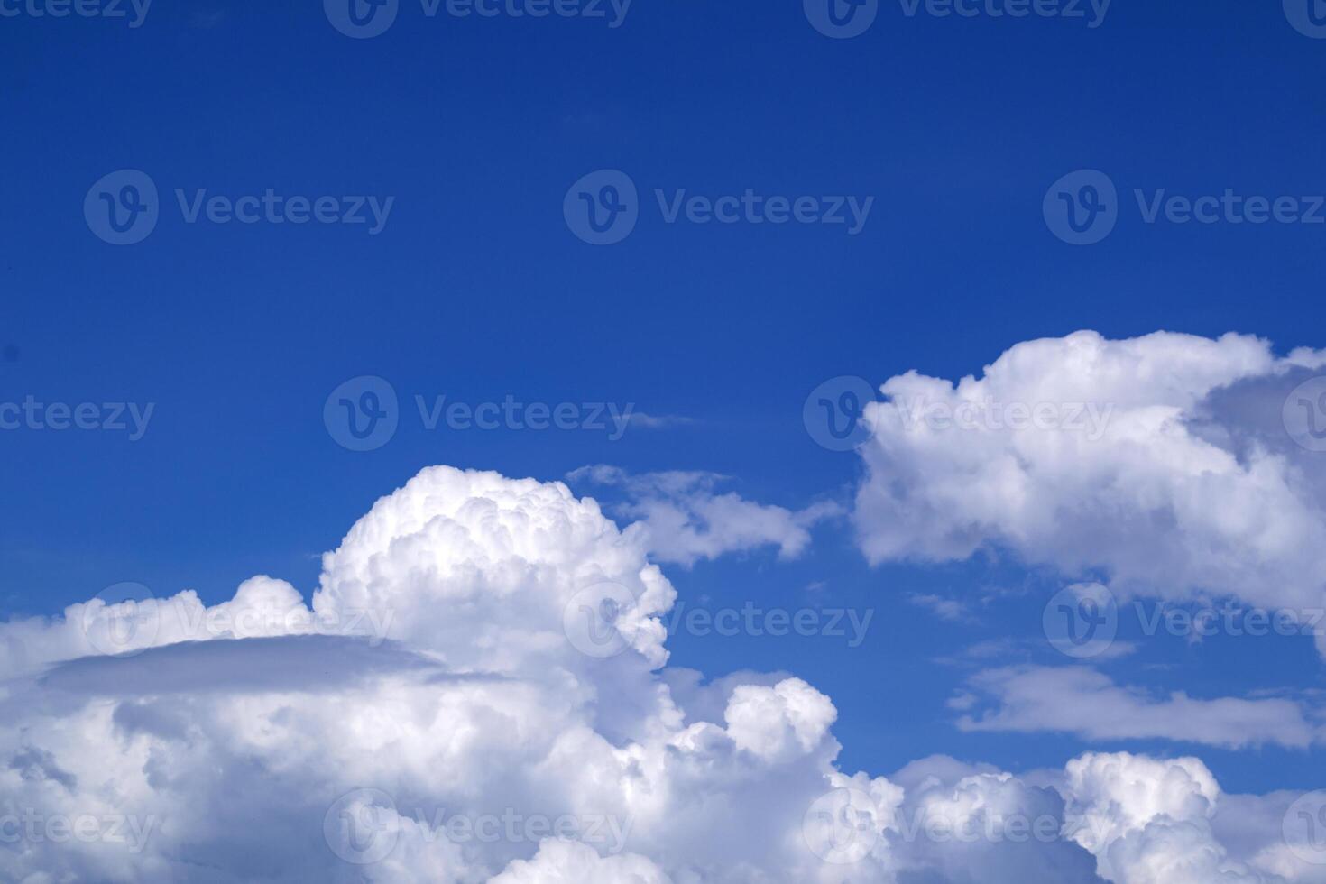 The blue sky with beautiful white clouds. photo