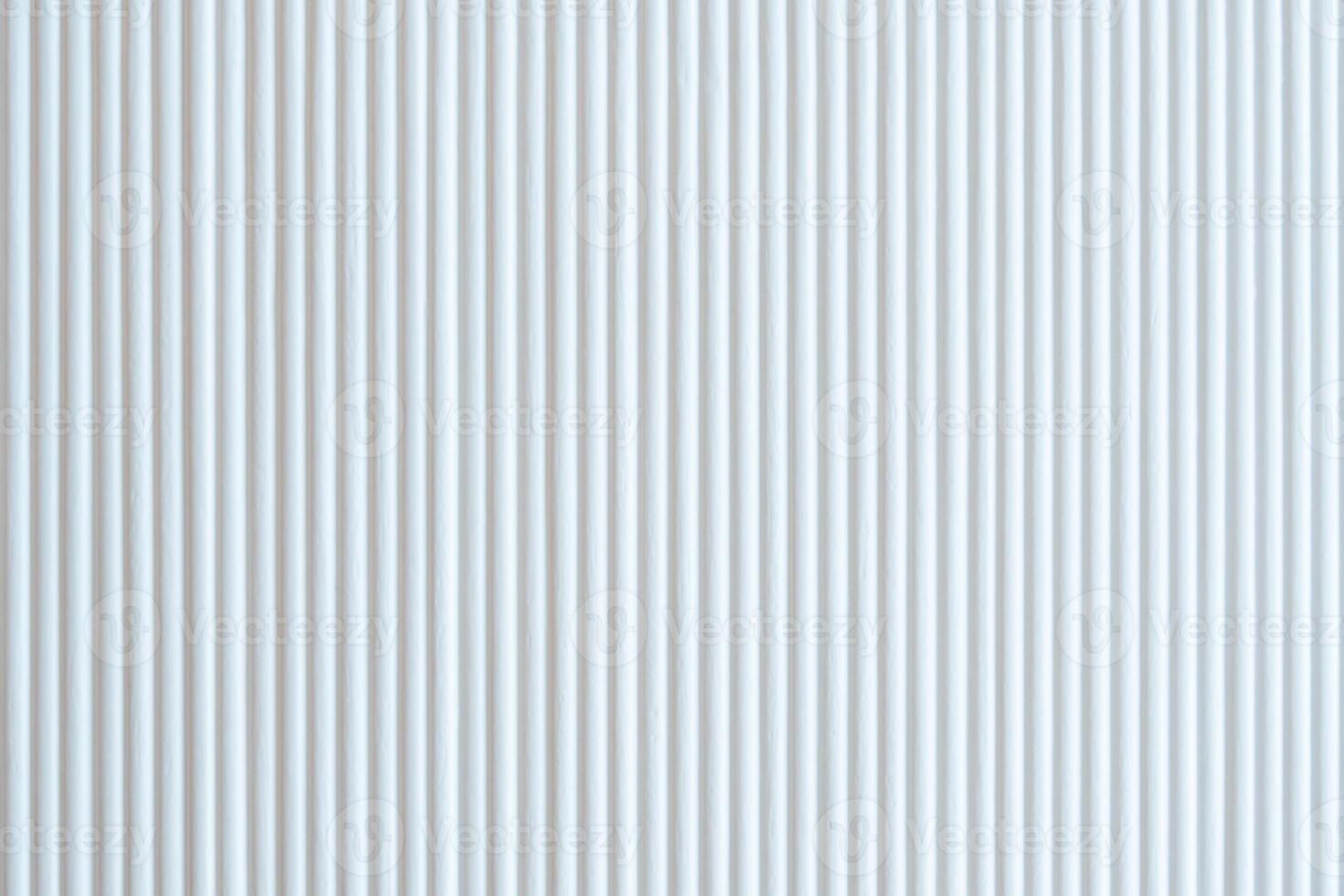 White wooden wall showcasing repetitive lines pattern and industrial texture background for modern urban decorative or minimalist design photo