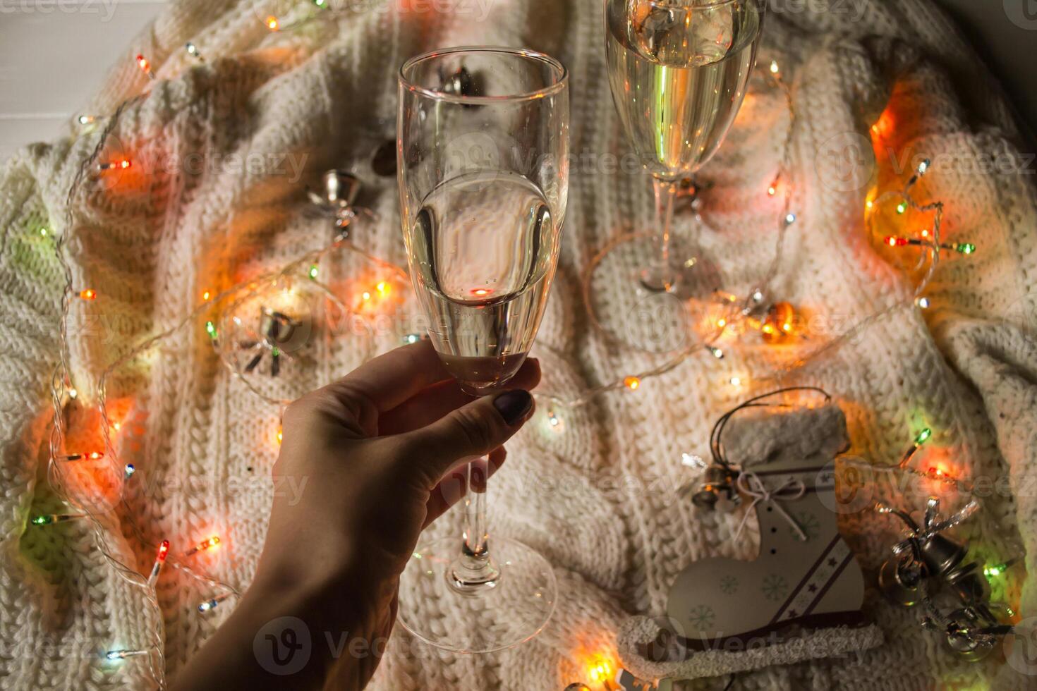 The glasses of champagne and christmas decoration. photo