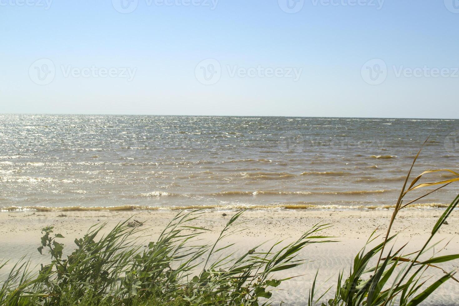 Seascape of Azov Sea. No one on the beach. Beautiful coast. photo