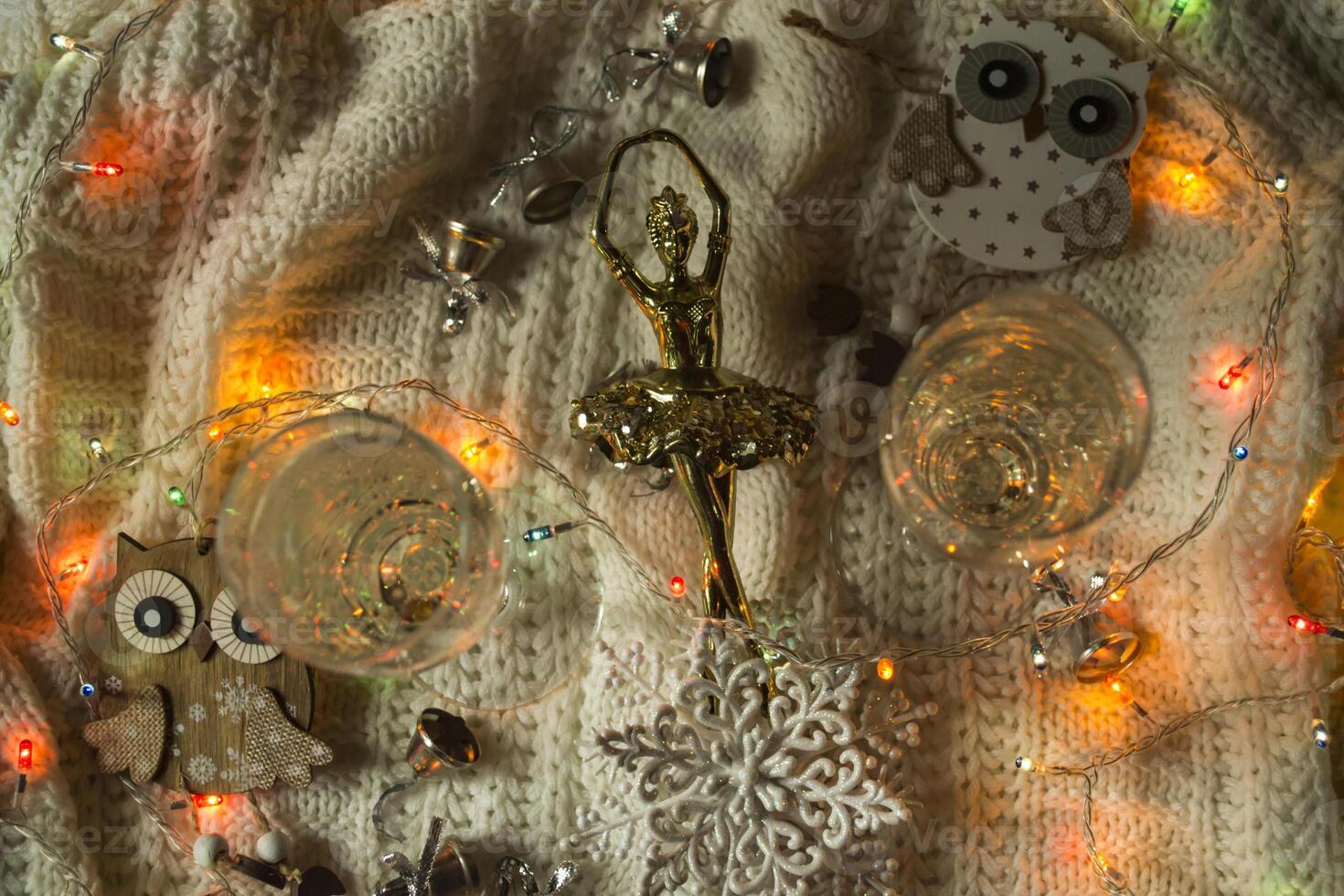 The glasses of champagne and christmas decoration. photo