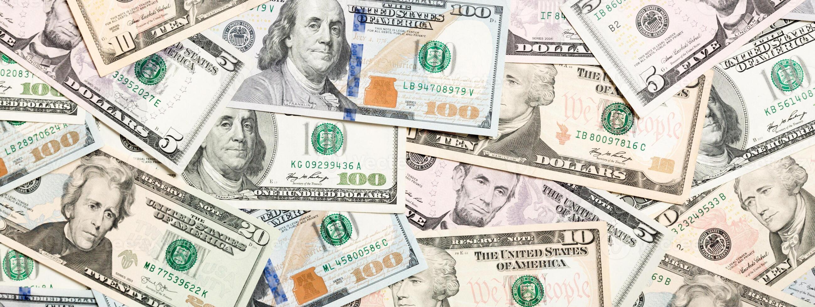 Top view of various dollar cash background. Different banknotes concept. Wealth and rich concept photo