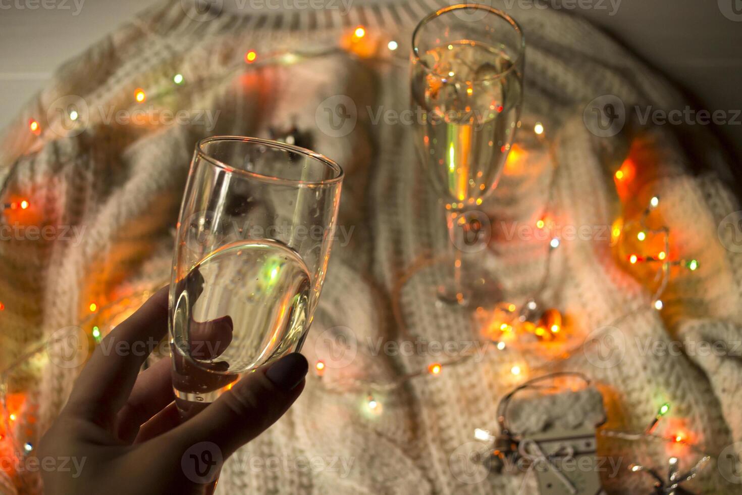 The glasses of champagne and christmas decoration. photo