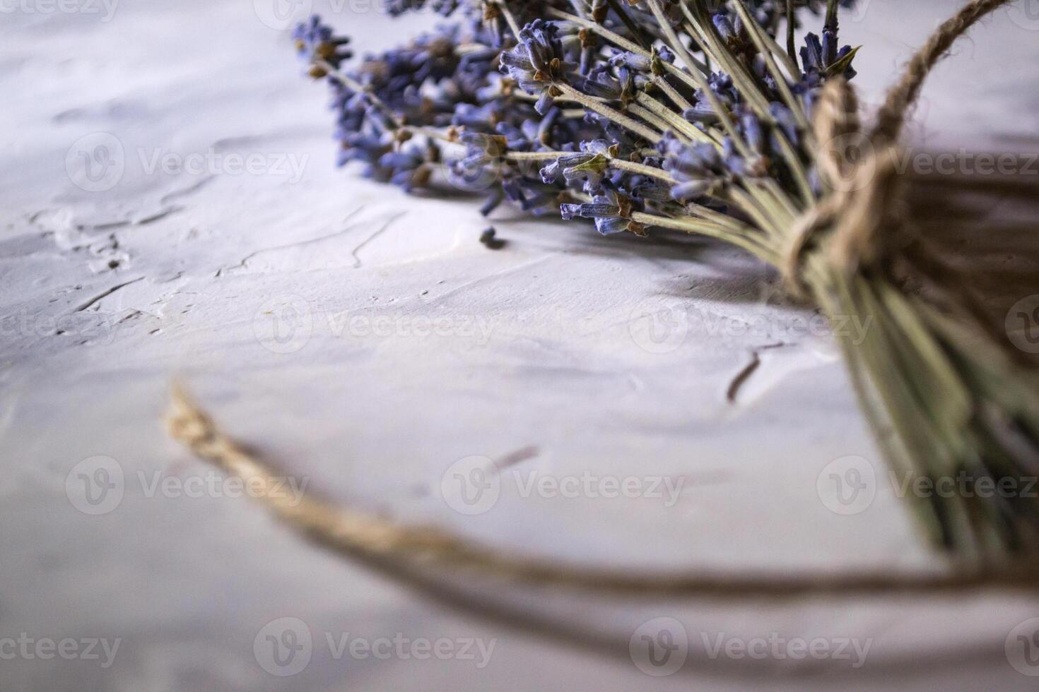 The bouquet of dried lavender on the desk. Close up. photo