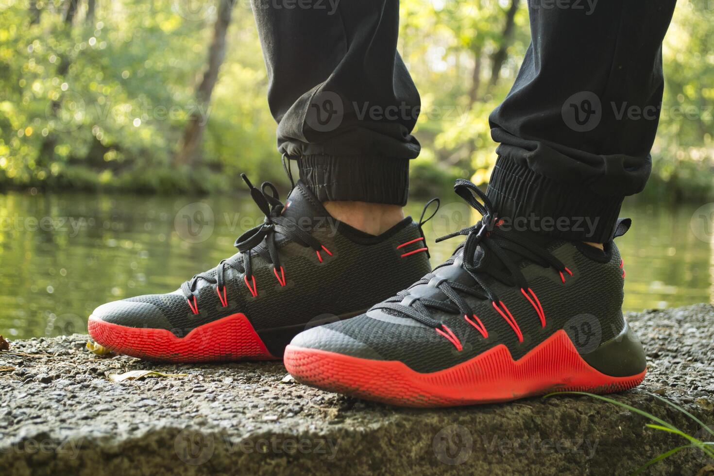 Man in sport sneakers outdoor. photo