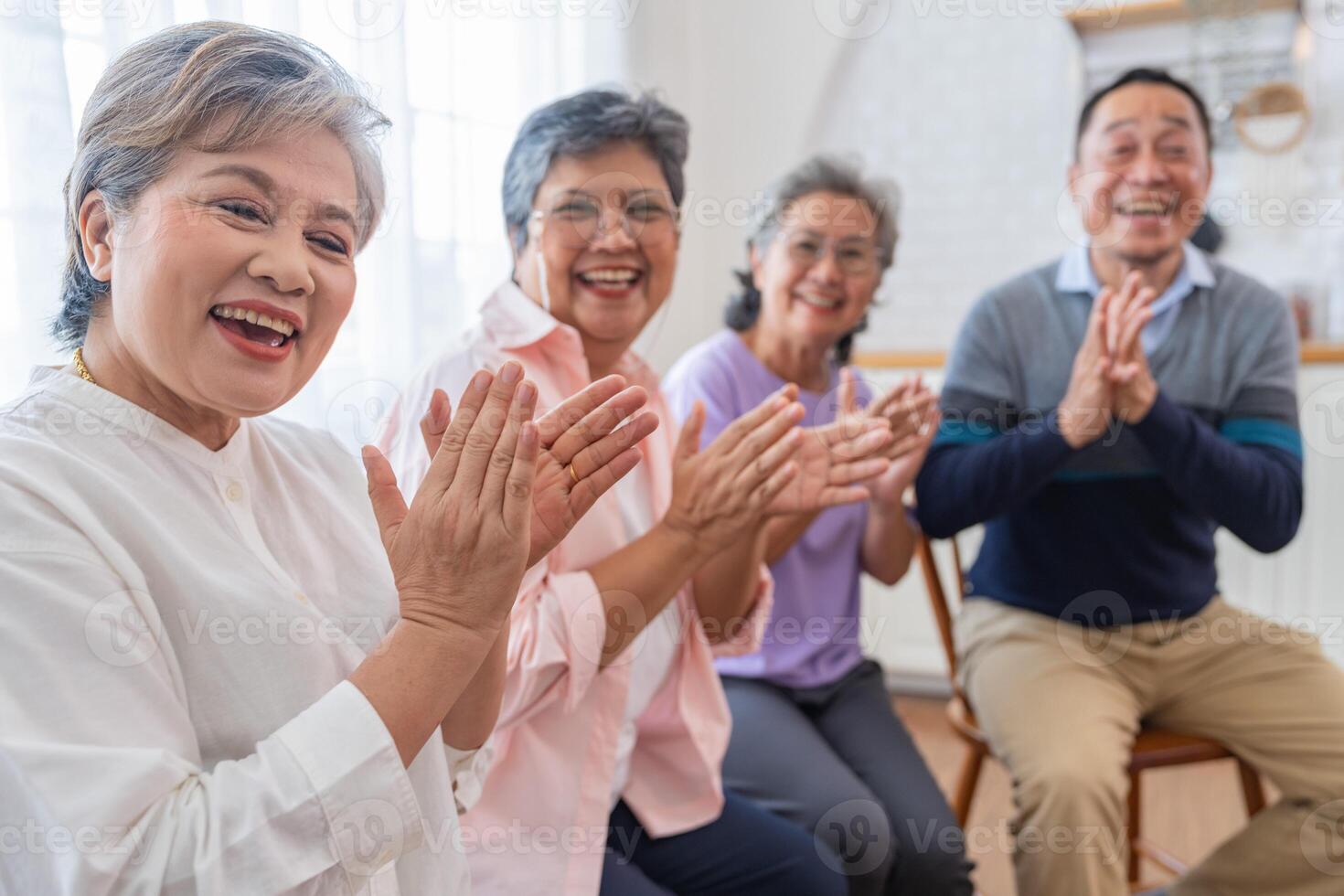close up faces senior people sitting on bench. older people are listening and enjoy meeting focus group at living room. Joyful carefree retired senior friends enjoying relaxation at nearly home. photo