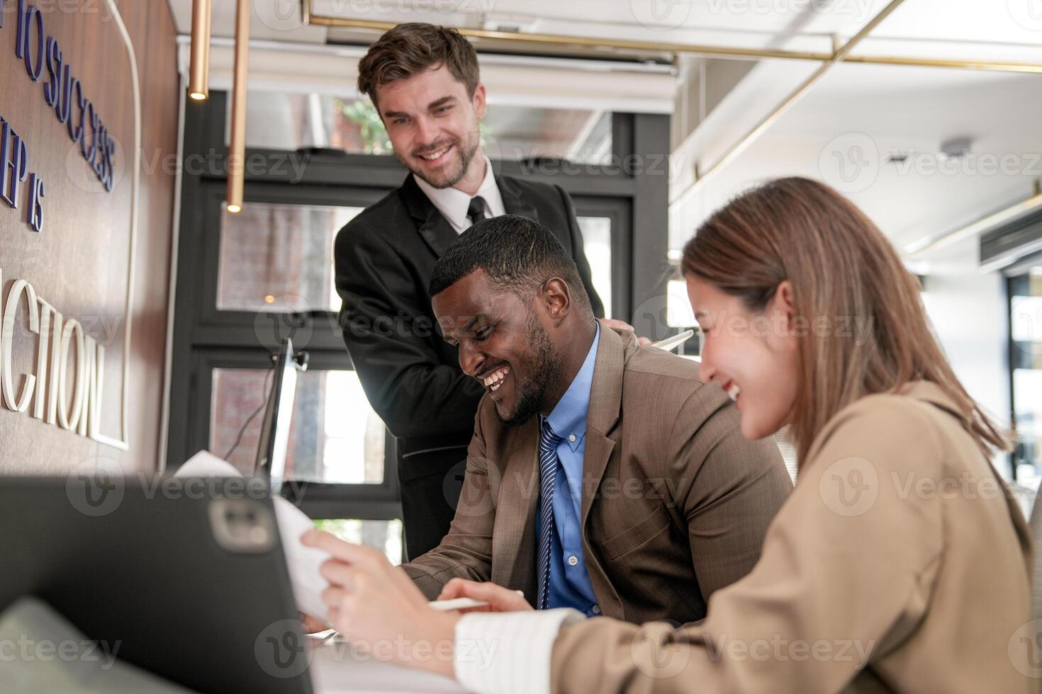 Diverse employees gathered in office having fun during brainstorming while discussing new ideas project. Multiracial coworkers meeting at coworking space area. team of young people in office. photo