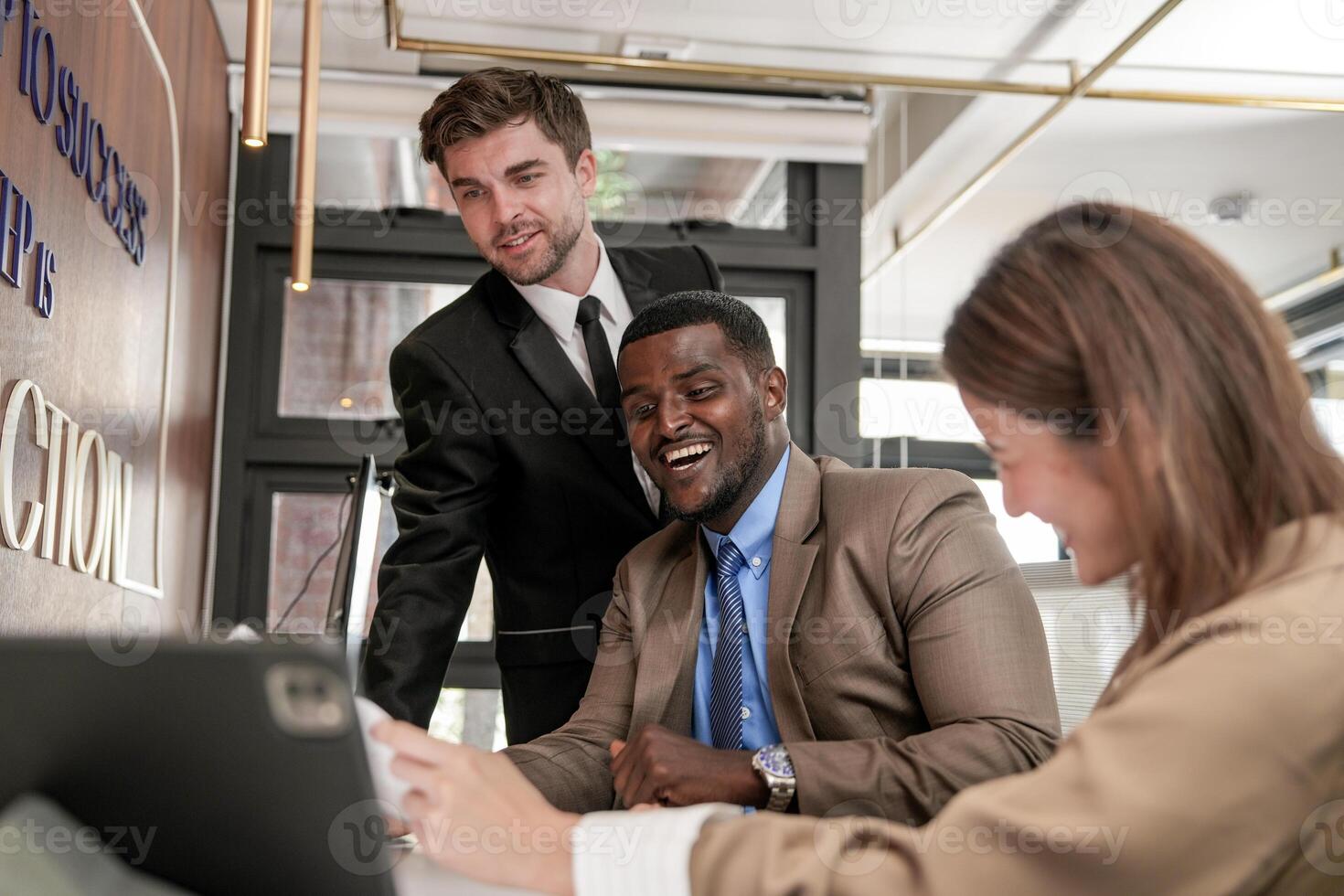 Diverse employees gathered in office having fun during brainstorming while discussing new ideas project. Multiracial coworkers meeting at coworking space area. team of young people in office. photo