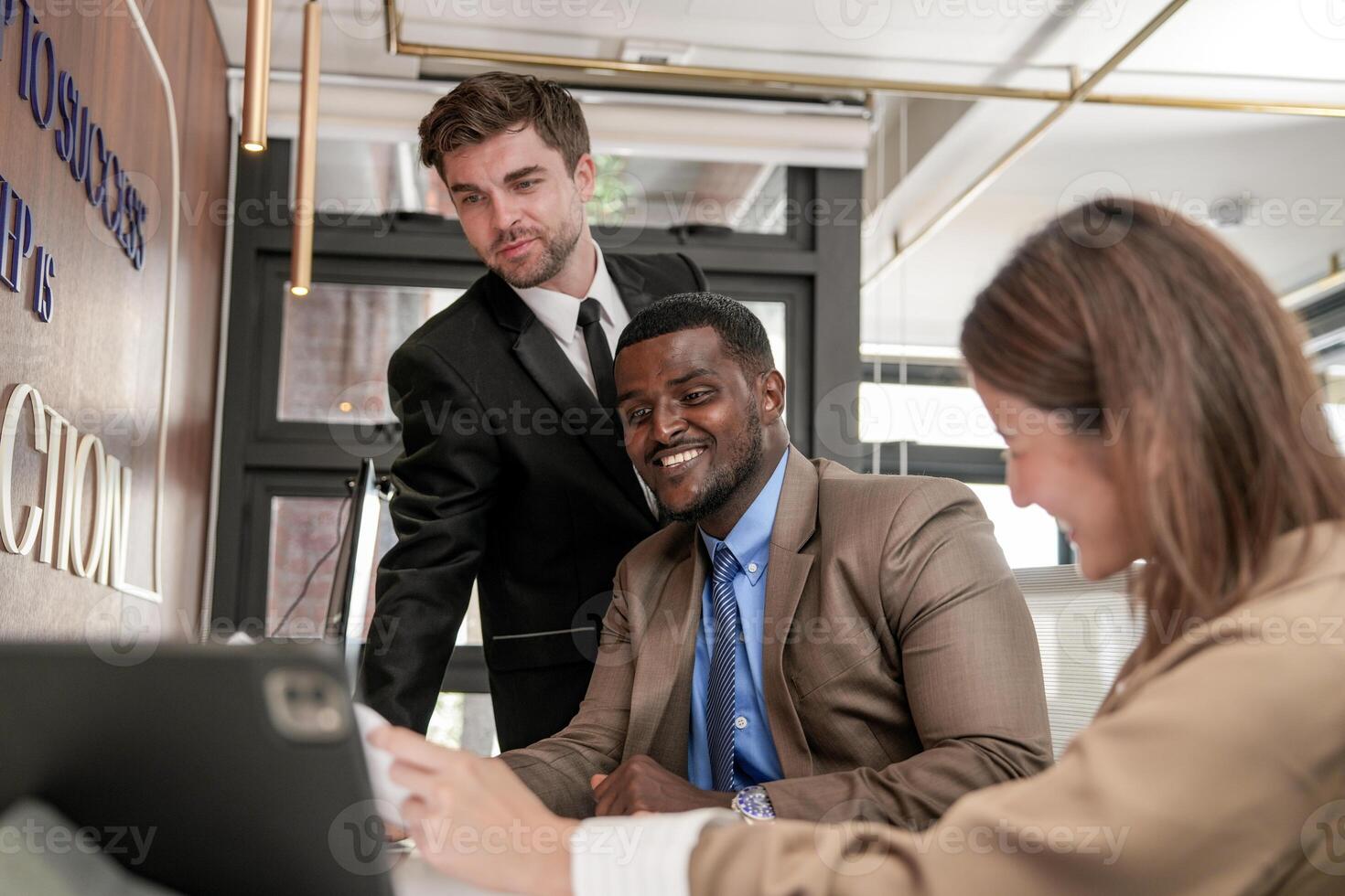 Diverse employees gathered in office having fun during brainstorming while discussing new ideas project. Multiracial coworkers meeting at coworking space area. team of young people in office. photo