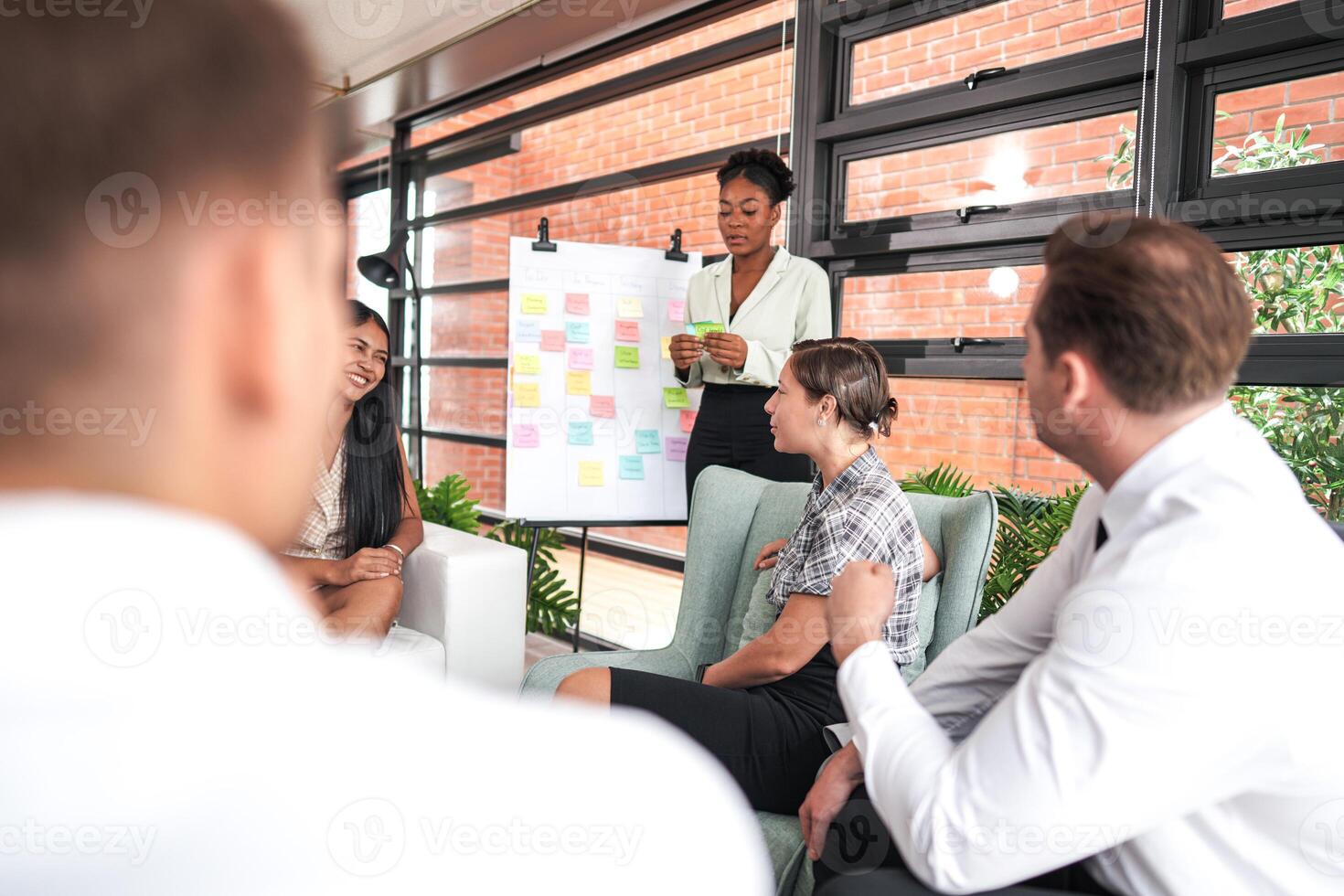 people talk and present the project. Relaxed informal business company meeting. Team leader brainstorming new approaches and ideas with colleagues. Startup business and entrepreneurship concept. photo