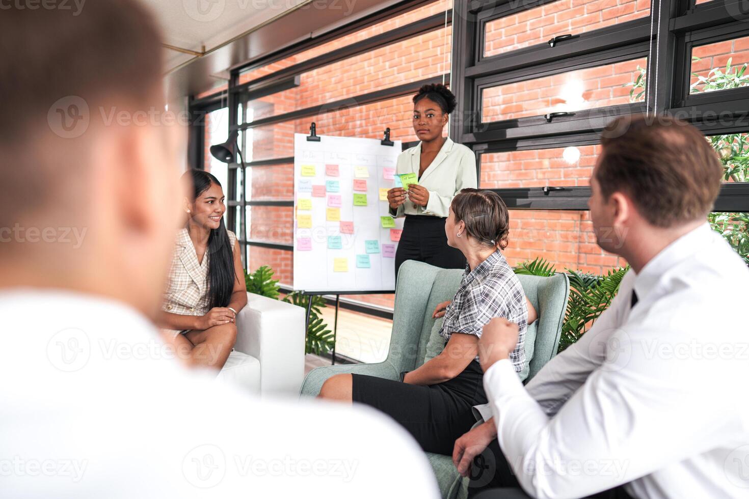 people talk and present the project. Relaxed informal business company meeting. Team leader brainstorming new approaches and ideas with colleagues. Startup business and entrepreneurship concept. photo