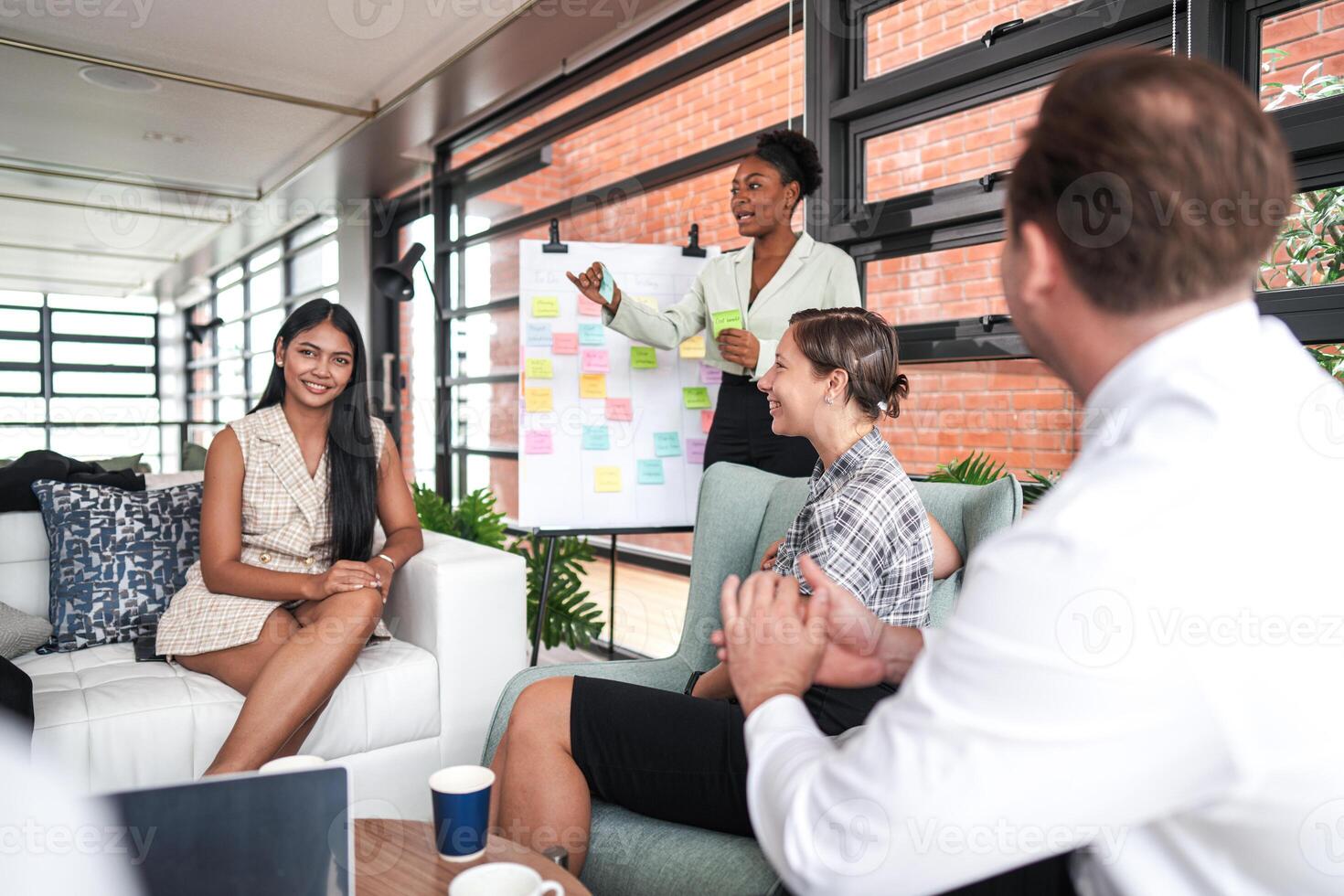 people talk and present the project. Relaxed informal business company meeting. Team leader brainstorming new approaches and ideas with colleagues. Startup business and entrepreneurship concept. photo
