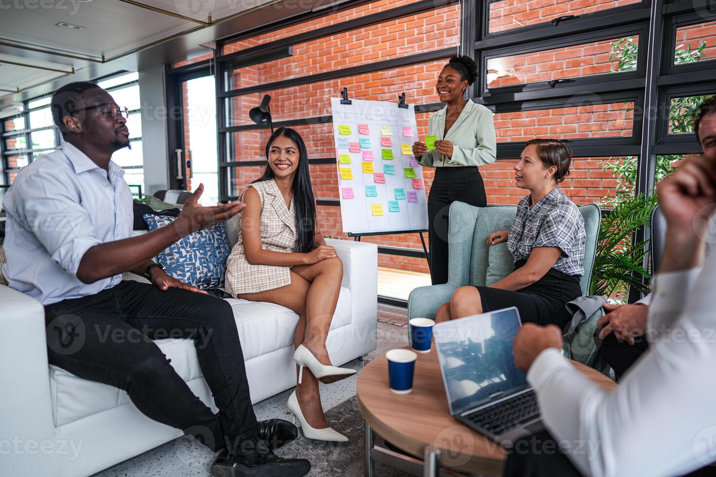 people talk and present the project. Relaxed informal business company meeting. Team leader brainstorming new approaches and ideas with colleagues. Startup business and entrepreneurship concept. photo