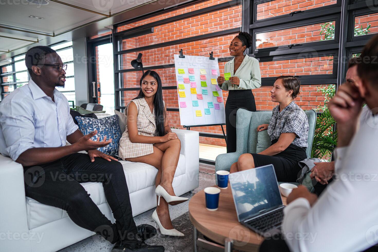 people talk and present the project. Relaxed informal business company meeting. Team leader brainstorming new approaches and ideas with colleagues. Startup business and entrepreneurship concept. photo