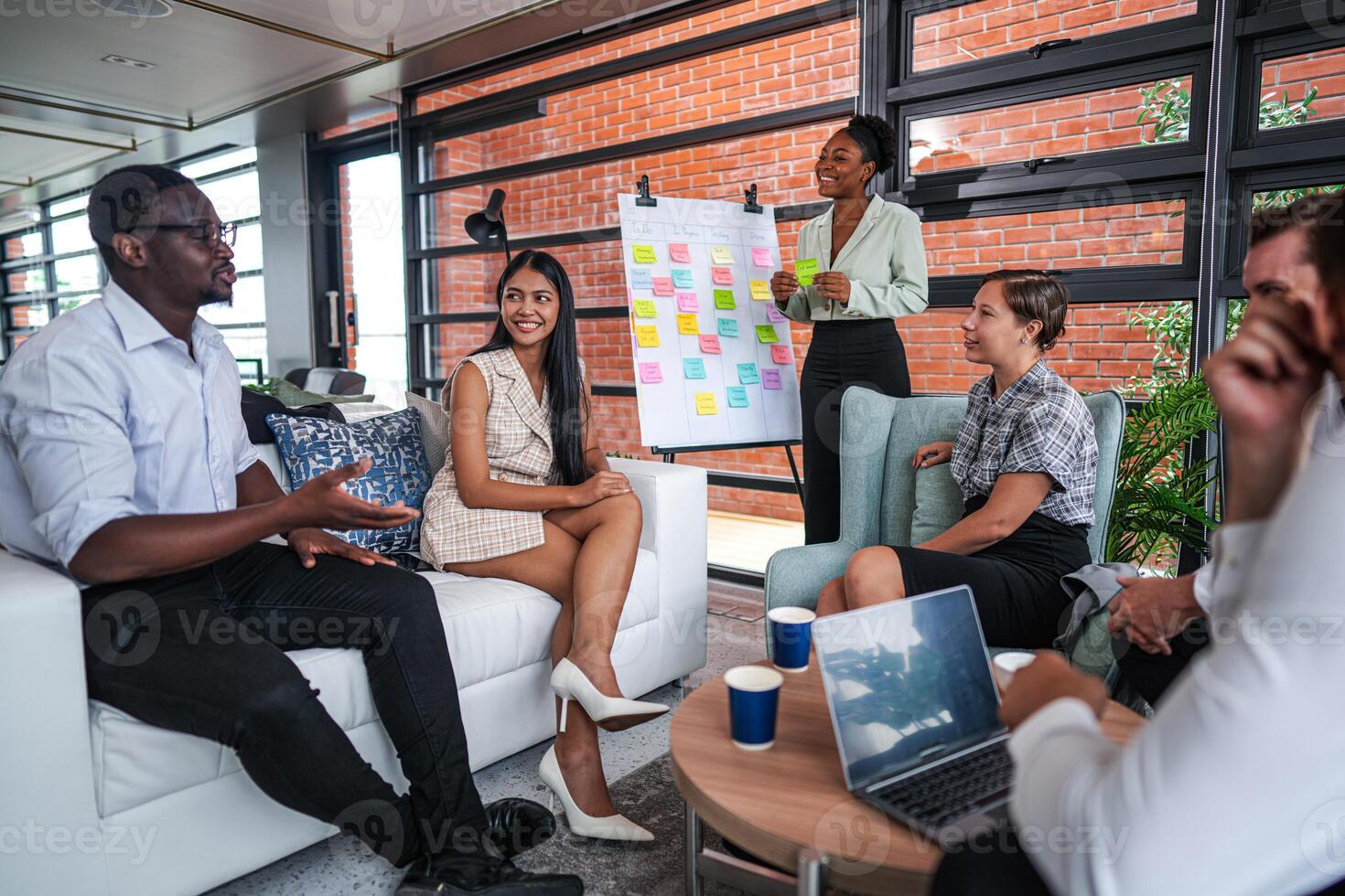 people talk and present the project. Relaxed informal business company meeting. Team leader brainstorming new approaches and ideas with colleagues. Startup business and entrepreneurship concept. photo