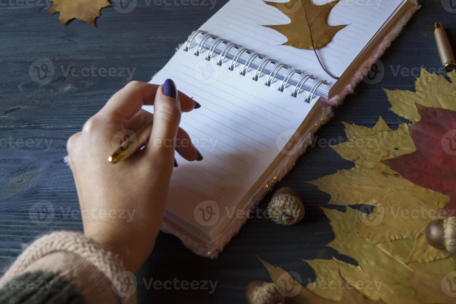 Hand writing in notebook. photo