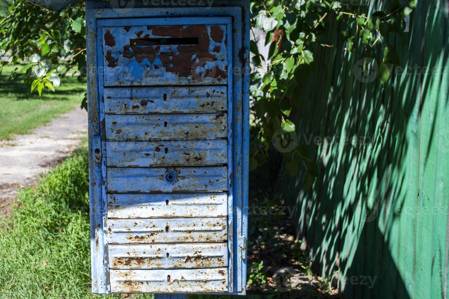 Old rusty mailbox. photo