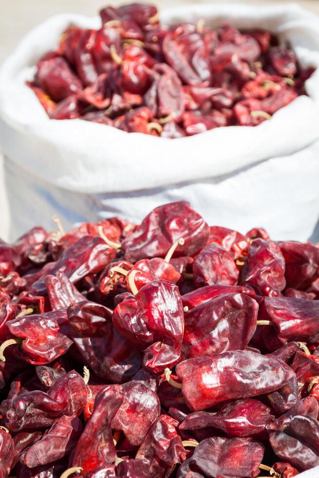 Red paprica in traditional vegetable market in Morocco photo