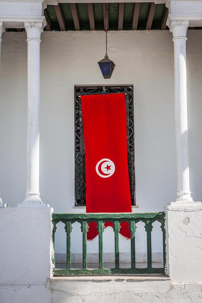 detail of Medina in Sousse, Tunisia with flag photo