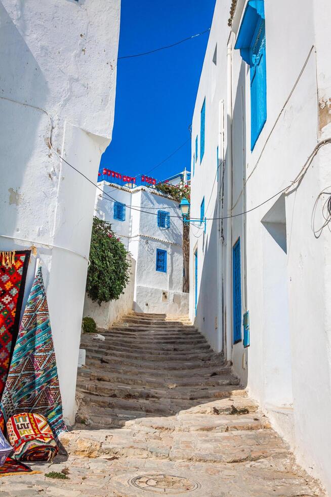 Street in the town of Sidi Bou Said, Tunisia photo