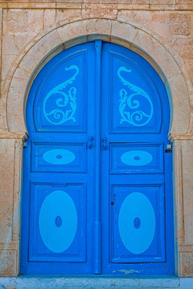 Typical local door of traditional home Tunis Tunisia photo