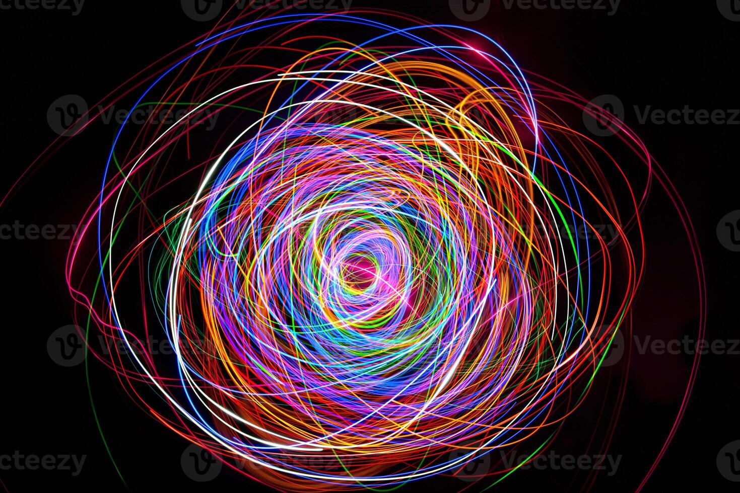 Moving swirls of colored lights photo