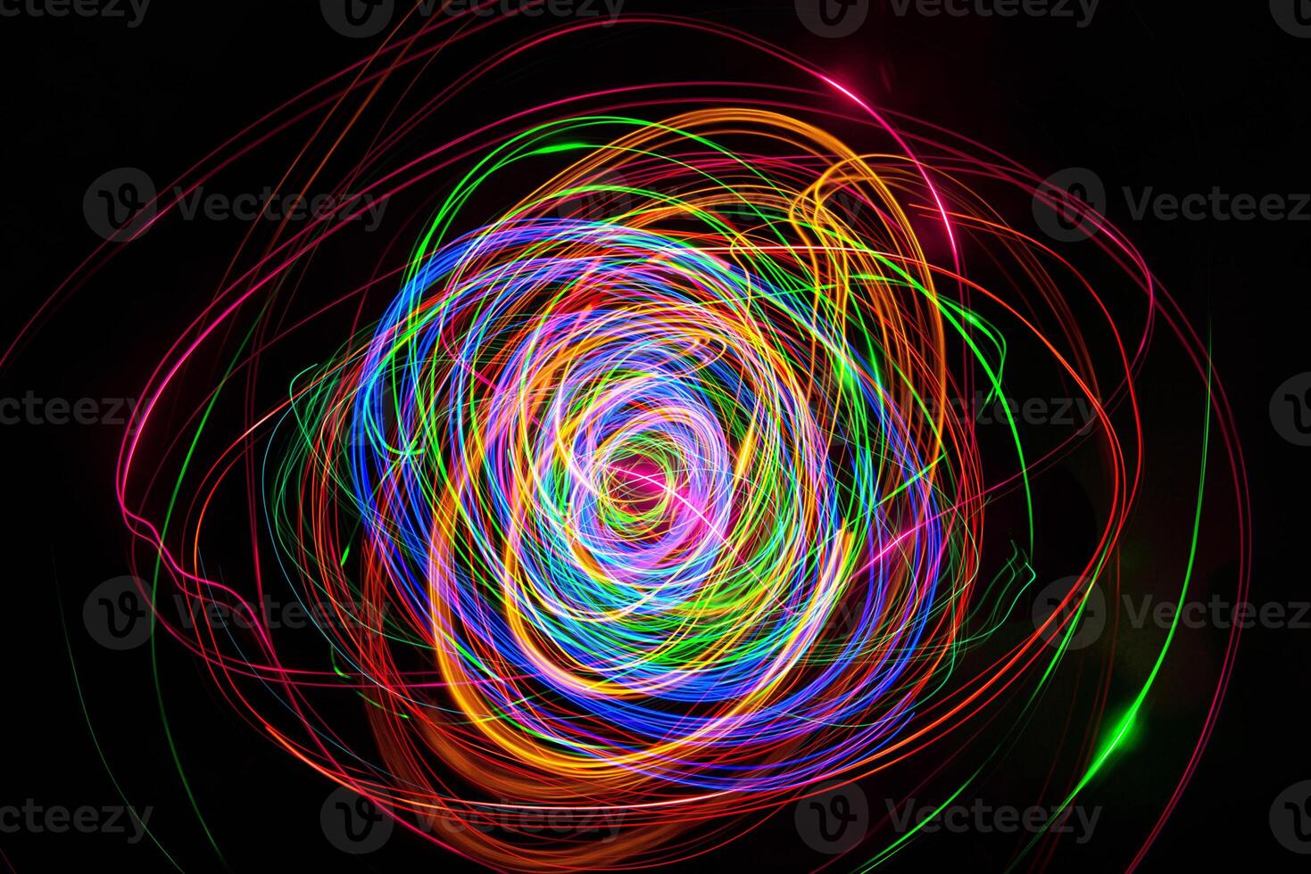 Moving swirls of colored lights photo