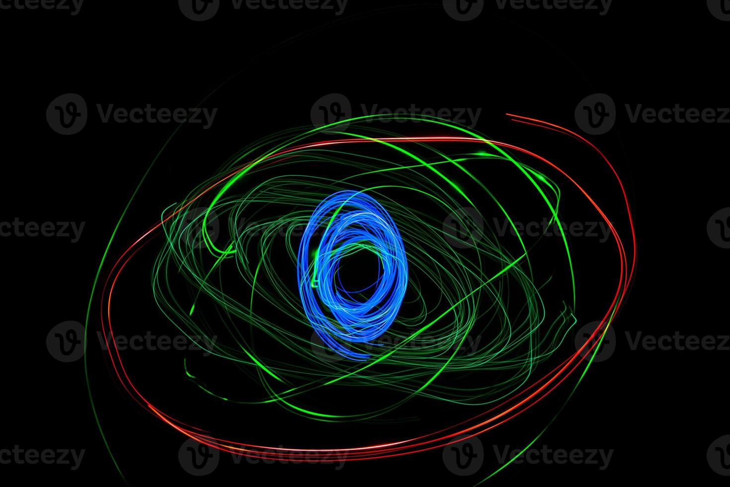 Moving swirls of colored lights photo