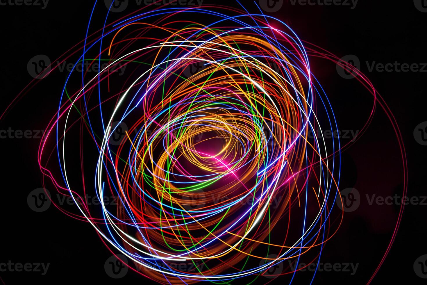 Moving swirls of colored lights photo