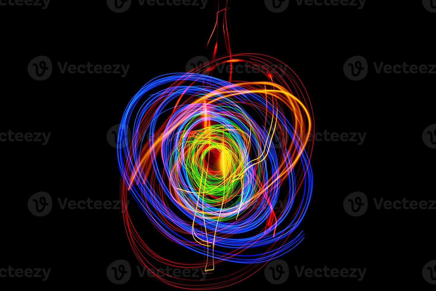 Moving swirls of colored lights photo